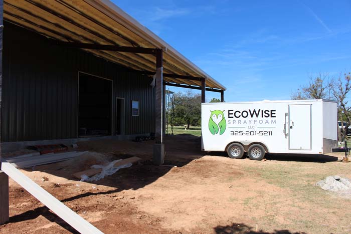 ecowise insulating a roof and walls of a metal barndominium